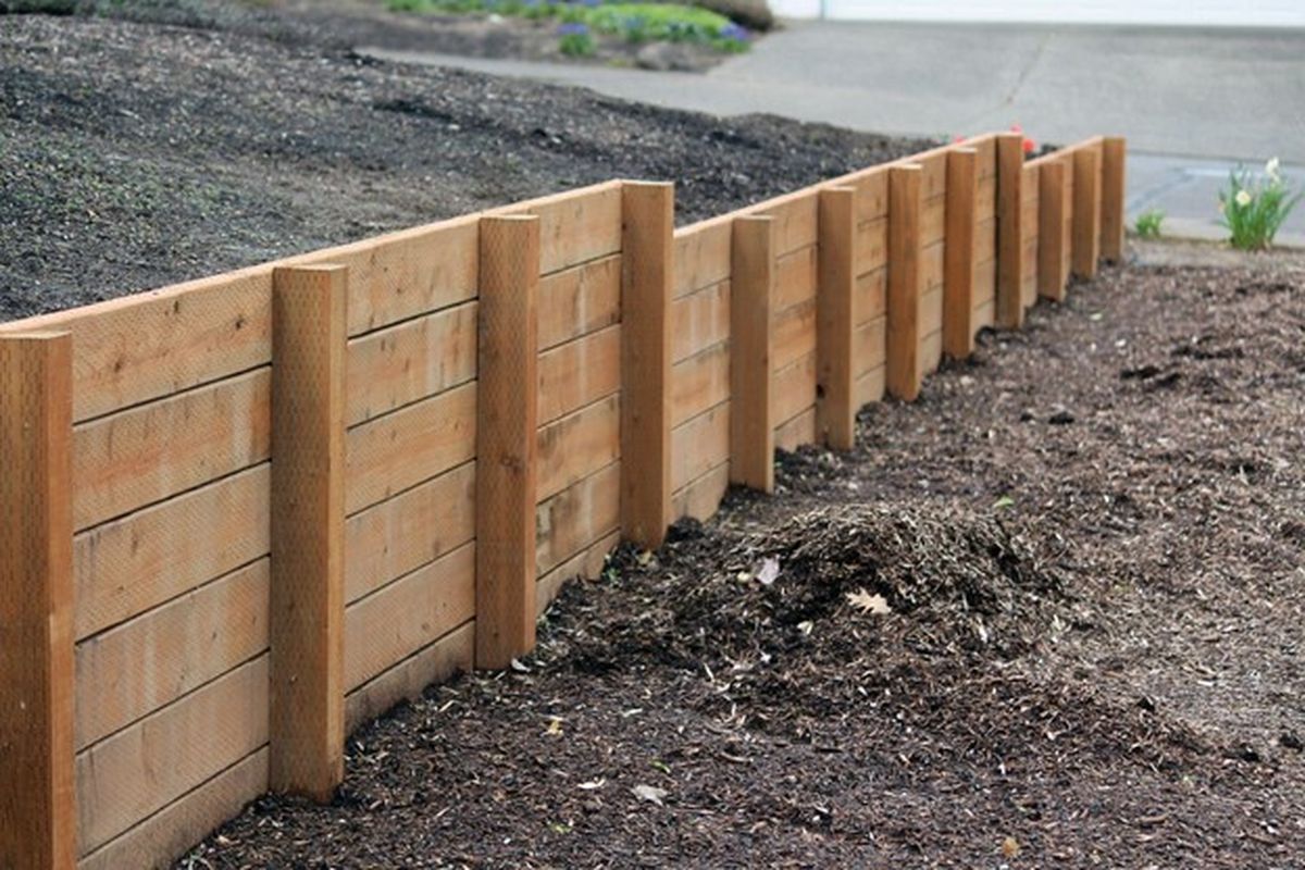 Natural timber sleeper retaining wall